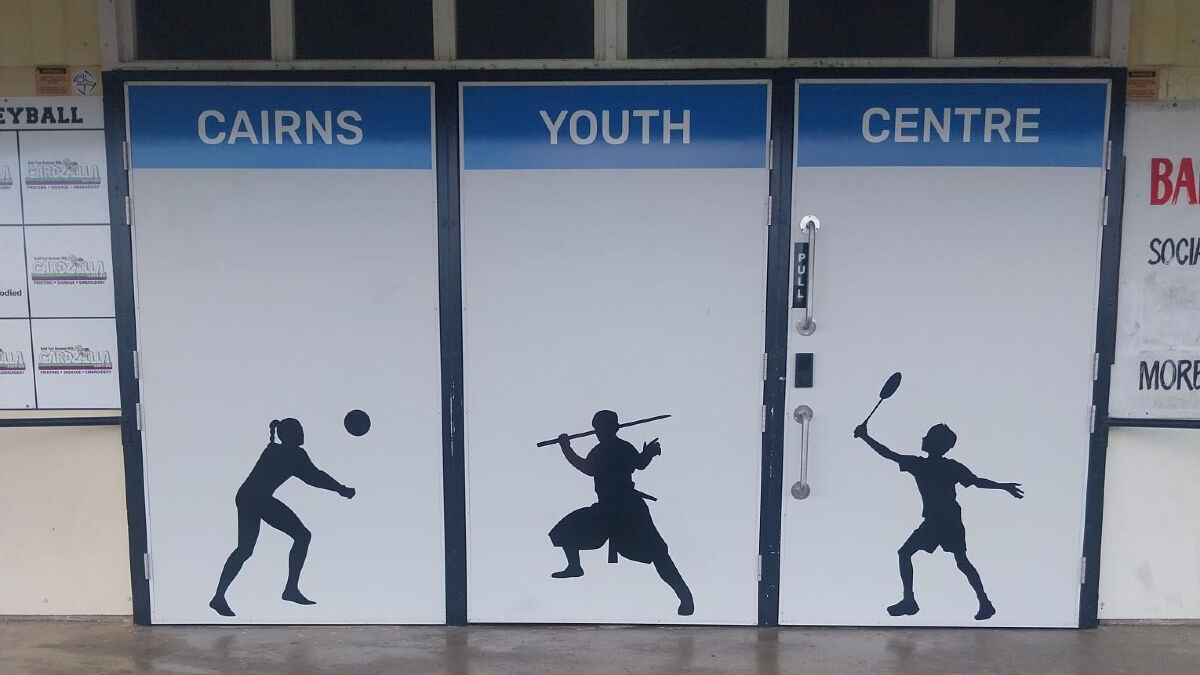 Three door panels with Cairns Youth Centre